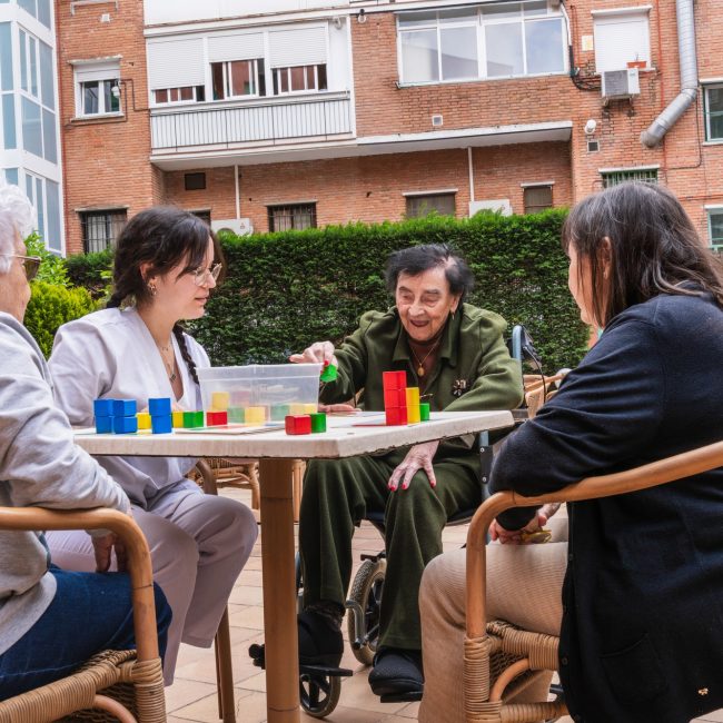 Elderly women engaging in outdoor social activities